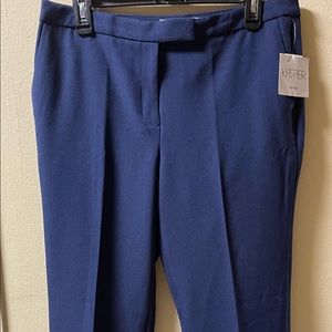 Pockets at side hips; besom pockets at back